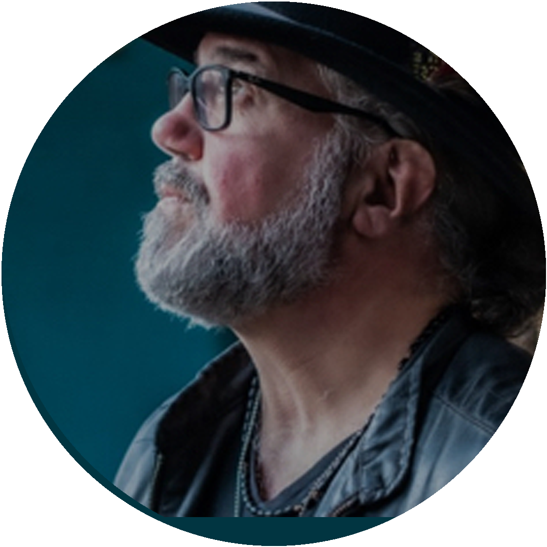 Side profile of Jeff Stewart in a hat